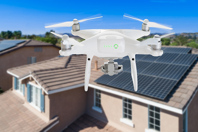 Aerial drone flying over a florida neighborhood during a home inspection