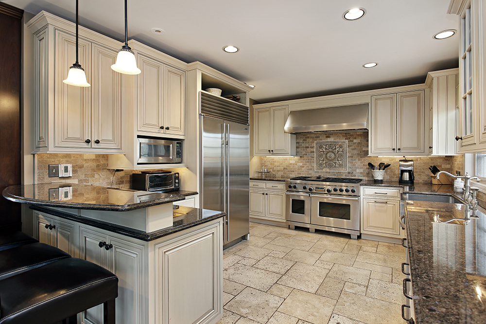 Upscale kitchen in a luxury house being inspected by one of our home inspectors